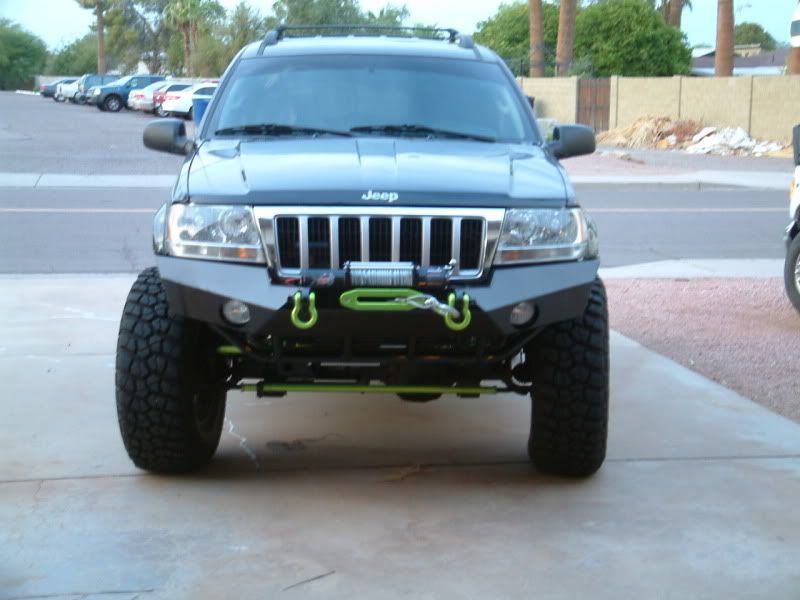 04 WJ, Limited, 4.7 HO, 242 Swap, 6" Clayton Longarm'd, 35" BFG KM2's, 17" WER Beadlocks OMF